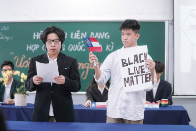 Role-playing as the Governor, U.S. Citizens, and 11th-Grade students siscussing racial discrimination