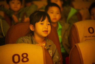 First graders experience the traditional art of water puppetry