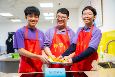 Grade 8 students show off their cooking skills, "decoding" the macronutrient triangle